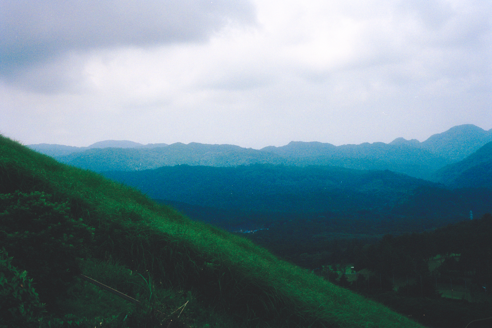 Green hills and misty mountains